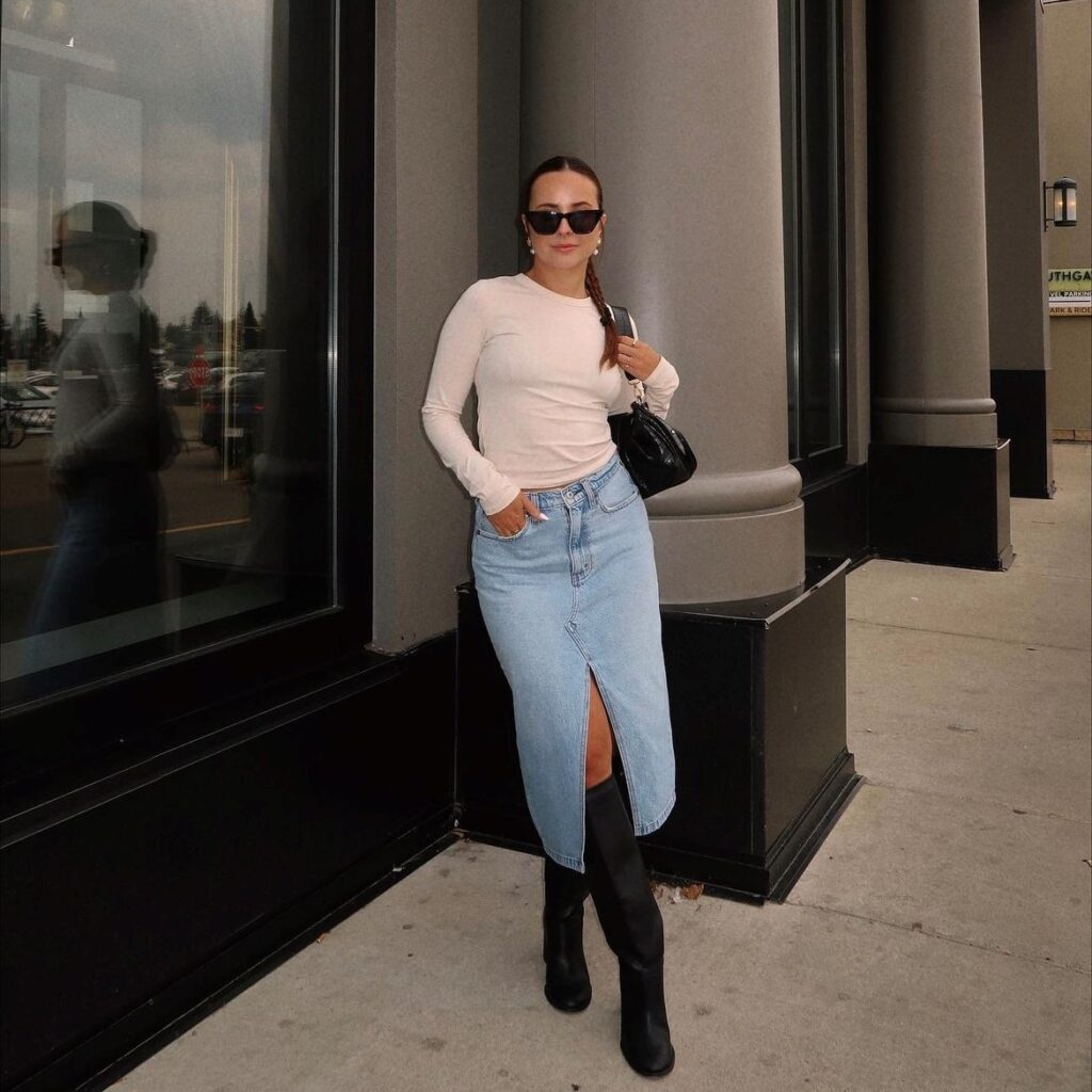 woman wearing one with a long sleeve tee and black boots