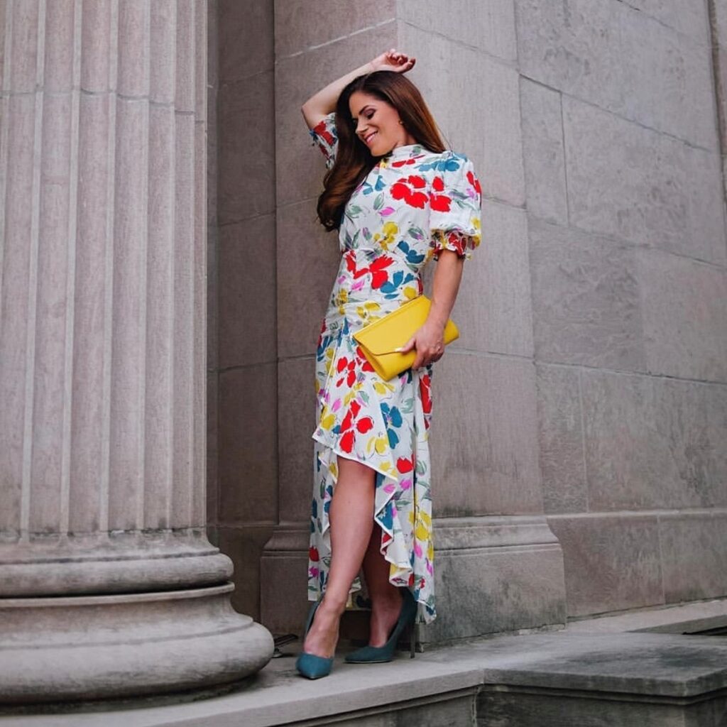 Woman wearing a floral dress with slit hemline