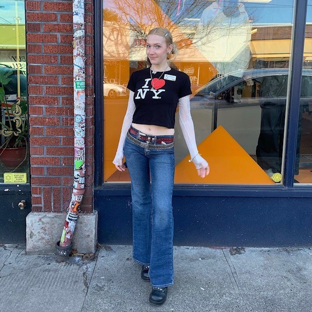 woman in black t-shirt and jeans