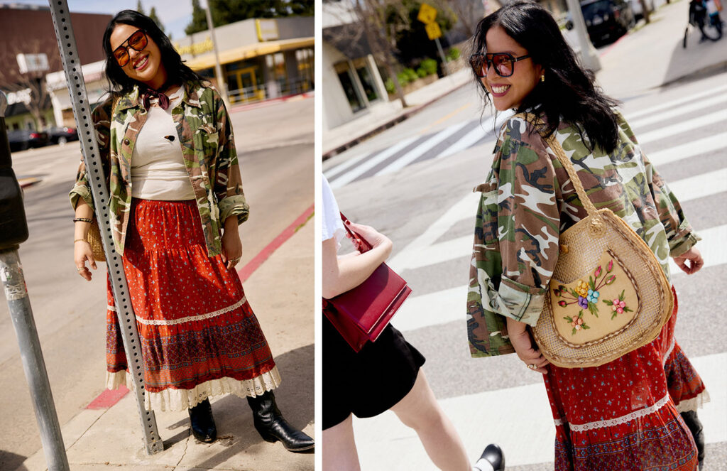 Andrea wearing a camo jacket, white tee and red skirt