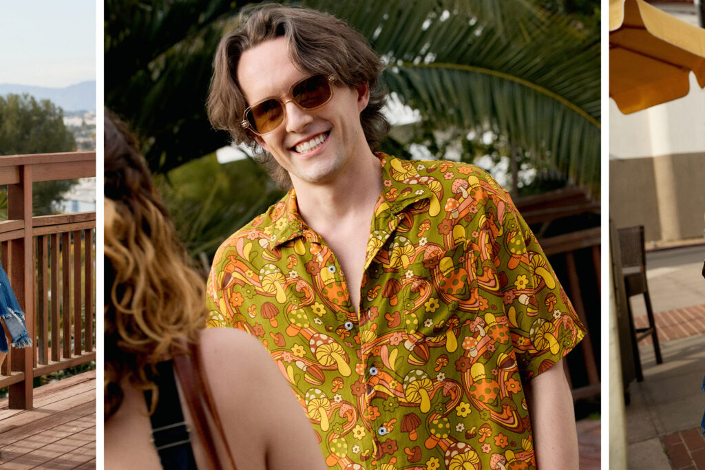 Eric wearing summer fashion with palm trees in the background