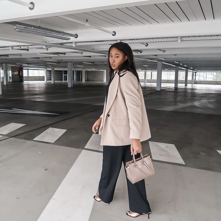 photo of woman in blazer