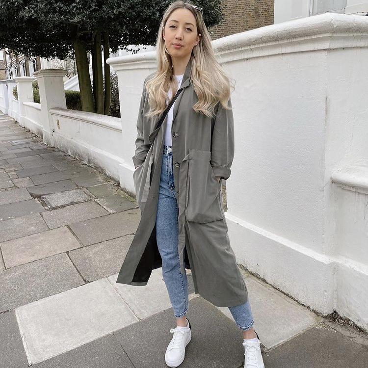 photo of woman in trench coat