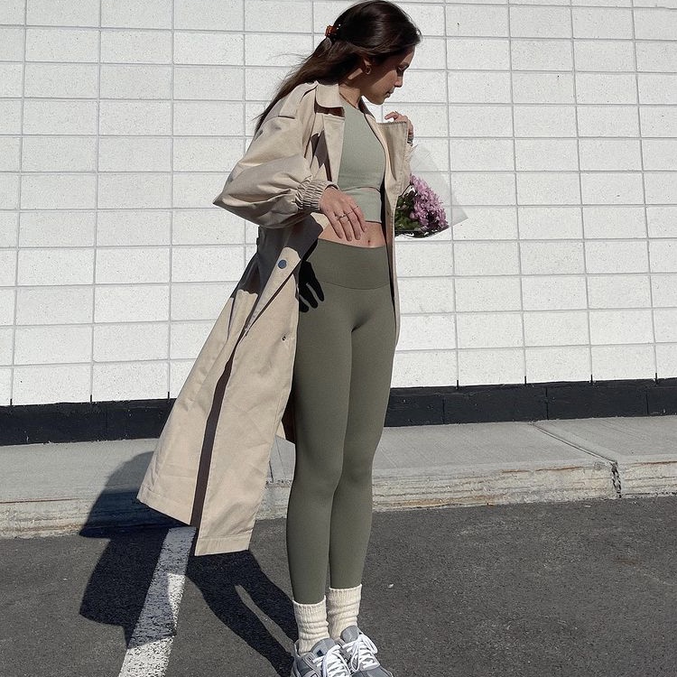 photo of woman in trench coat