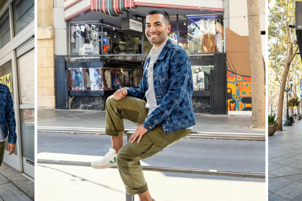 Model wearing spring fashion sitting on bus stop