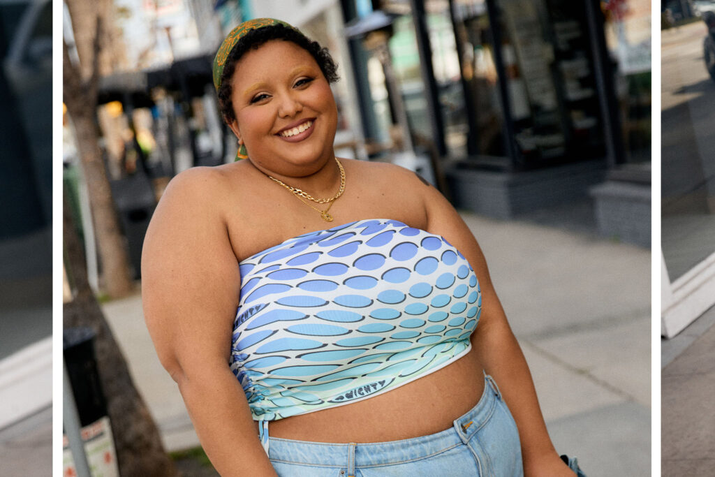  Kyrah wearing a blue tube top and denim shorts