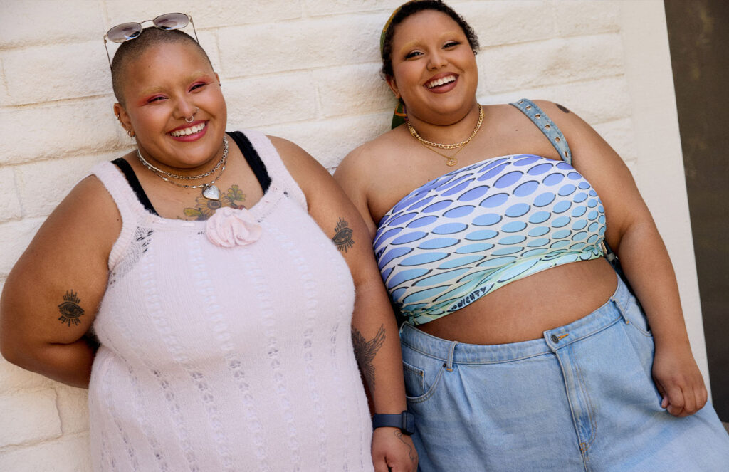 Tahra and Kyrah wearing summer fashion smiling at the camera